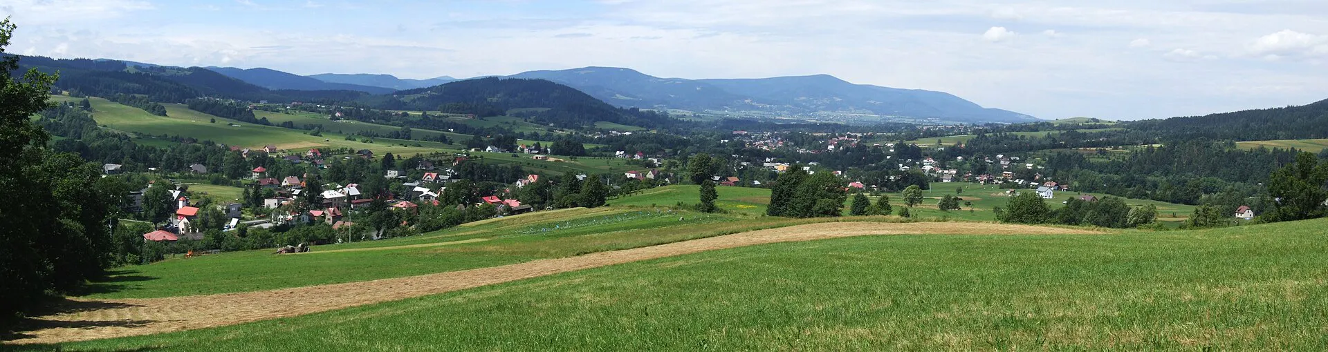 Panoramic view across the green Beskydy Mountains